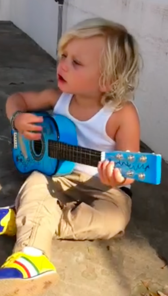 A young Zuma following in his famous parents' footsteps from an early age