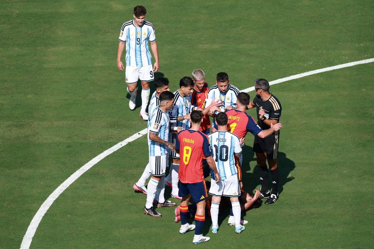 Players scuffle after a foul by Leandro Paredes #5 of Argentina on Rodri #16 of Spain