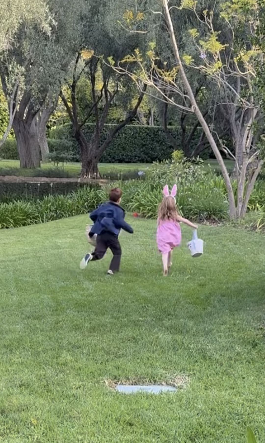 Archie and Lilibet racing to find Easter eggs