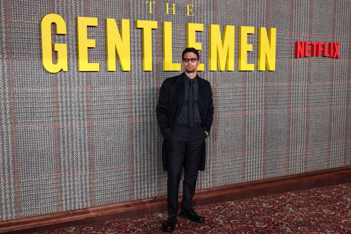 English actor Theo James poses on the red carpet upon arrival to attend the Global Premiere of "The Gentlemen" UK Series in central London on March 5, 2024. (Photo by Adrian DENNIS / AFP) (Photo by ADRIAN DENNIS/AFP via Getty Images)