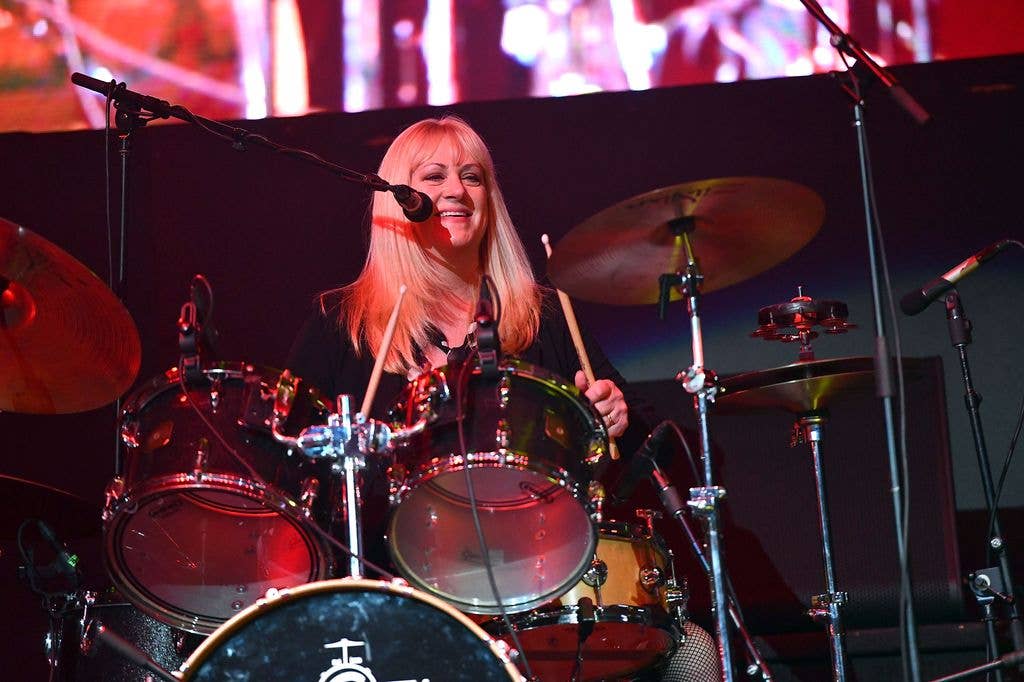 Debbi performs onstage during KEarth's Totally 80's Show in 2018