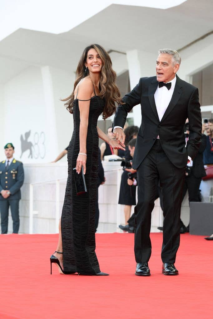 Amal wore a dramatic Tom Ford black gown to accompany George on Wednesday's ceremony