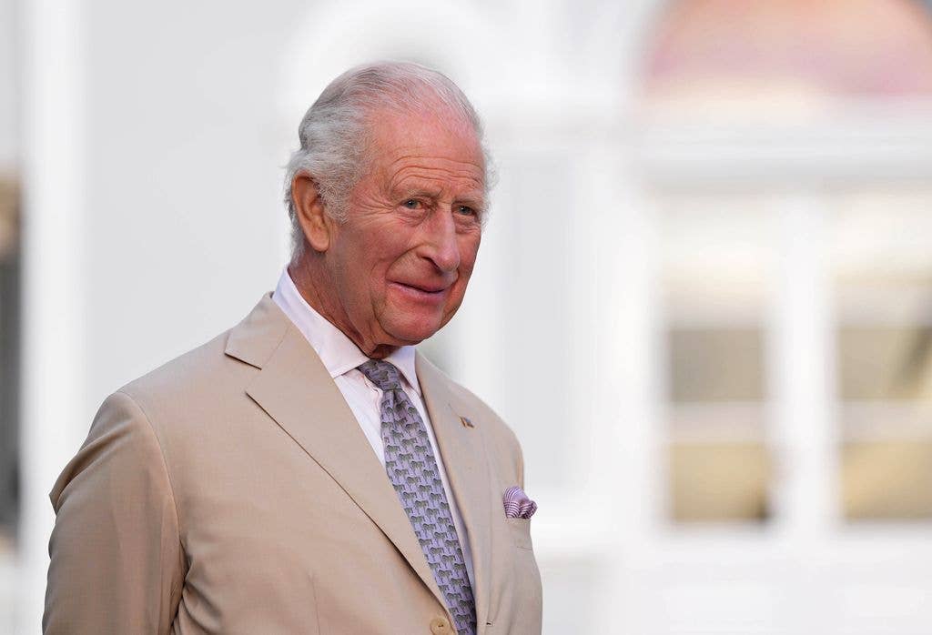 King Charles wearing a suit
