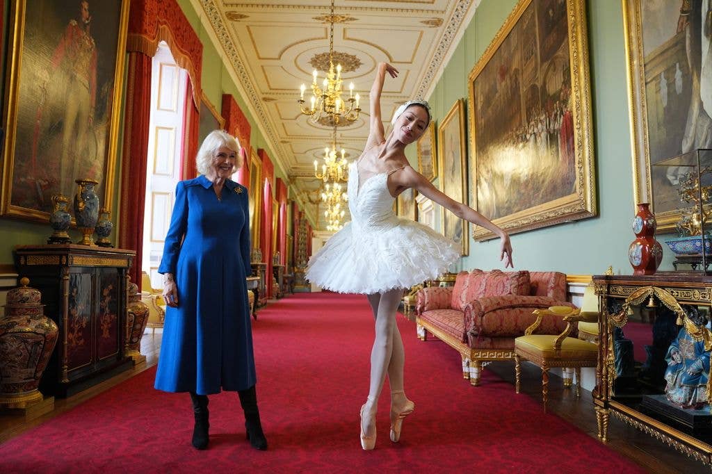 Queen Camilla, Patron of the English National Ballet, stands beside ballerina Sangeun Lee