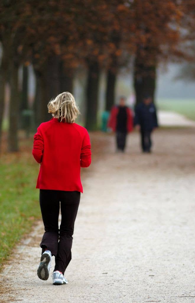 Jogging Woman in a red jumper