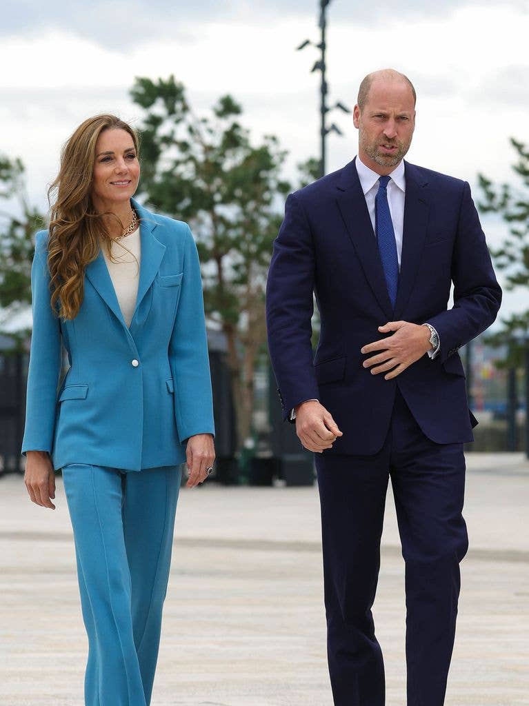 Kate Middleton and Prince William wearing suits
