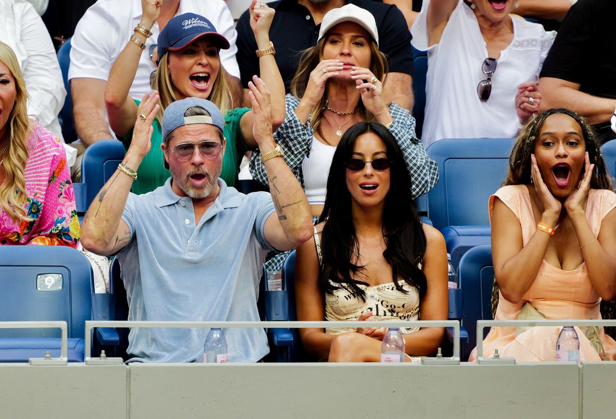 Brad Pitt, Ines de Ramon, and Jaden Sabathia in the stands on Day Fourteen of the 2026 US Open on Saturday, September 12, 2026 in Flushing, NY. (Photo by Michael Mooney/USTA via Getty Images)