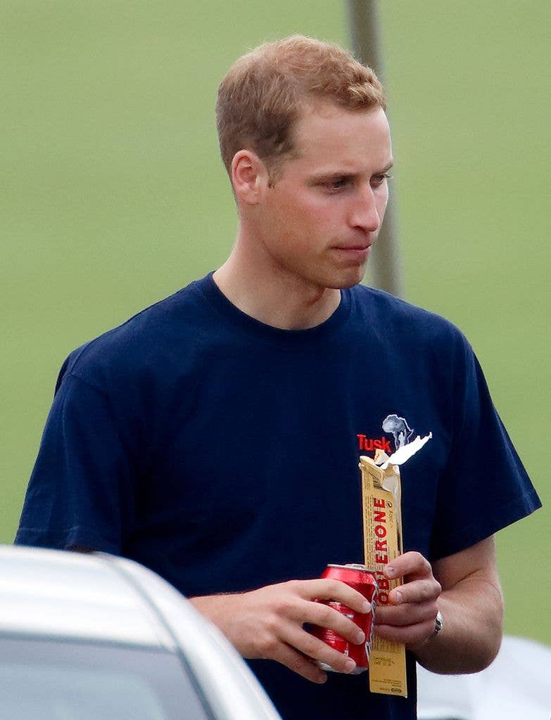 Prince William seen holding a can of Coca-Cola and a Toblerone chocolate bar 