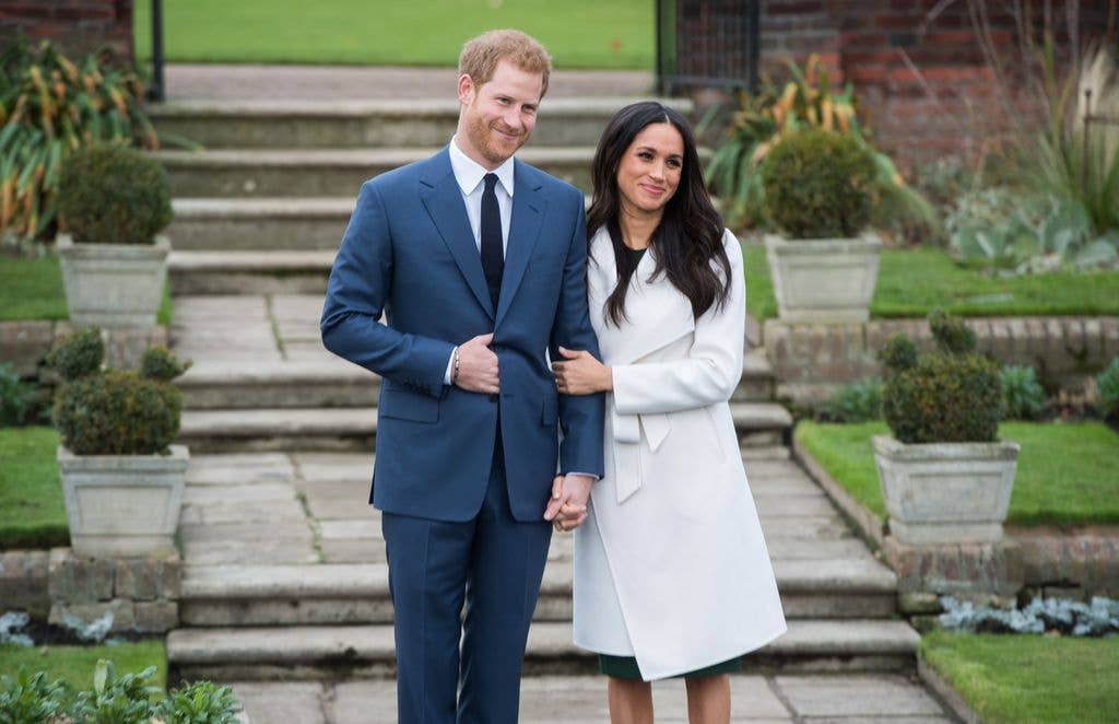 Prince Harry and Meghan Markle announcing their engagement in a sunken garden in Kensington Palace