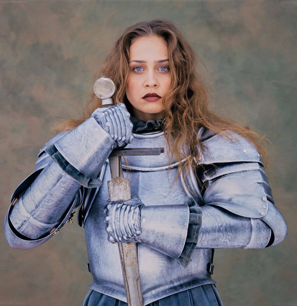 Singer Fiona Apple poses in a suit of armor, New York City, New York, November 1, 1997. 