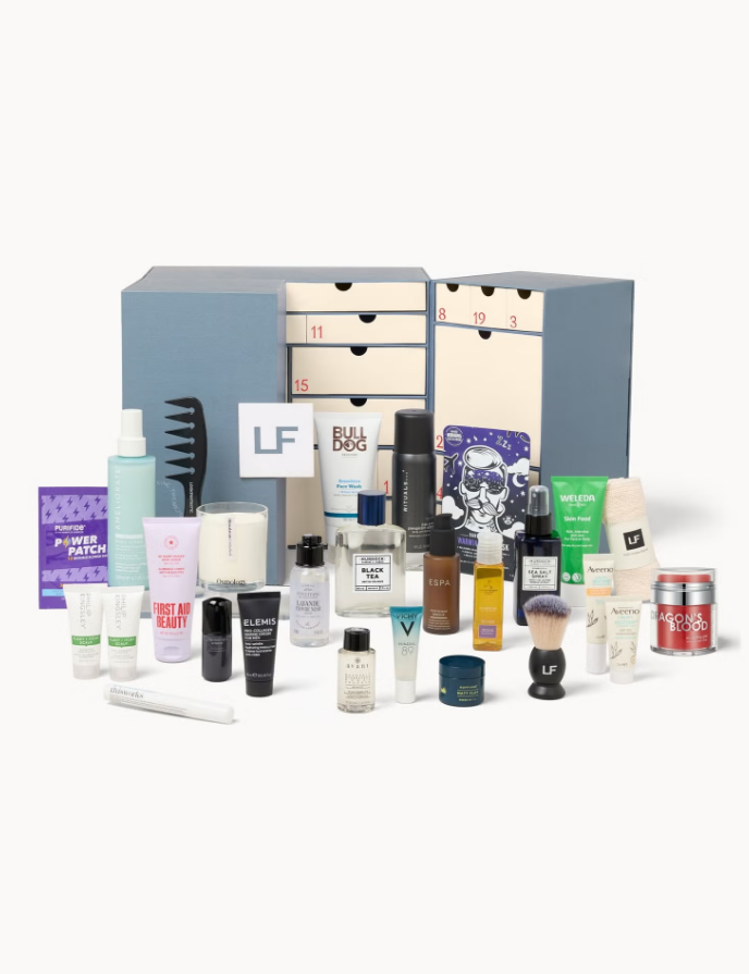  lookfantastic grooming advent calendar, collection of skincare and grooming products arranged on a white surface.