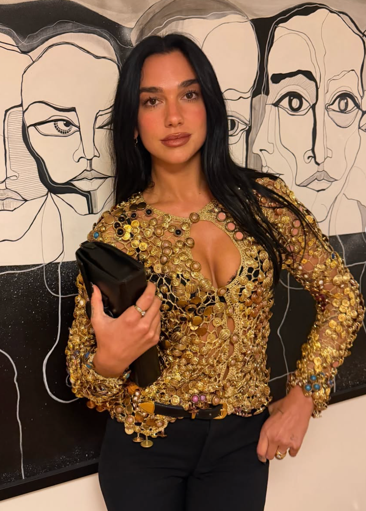 Dua looked incredible in the plunging gold top