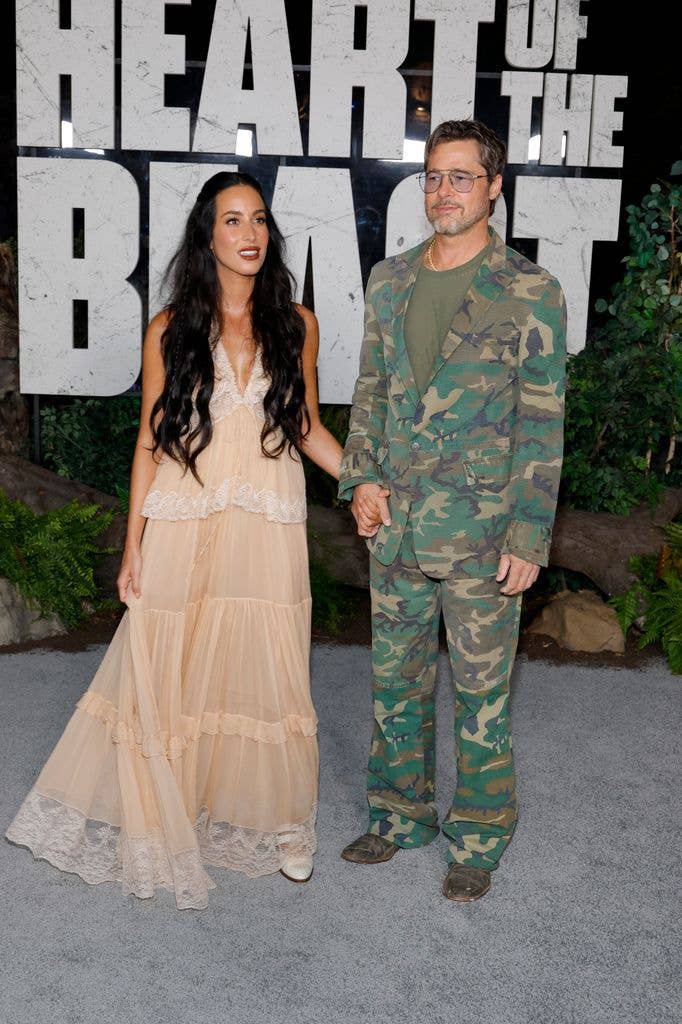 (L-R) Ines de Ramon and Brad Pitt attend Paramount Pictures' "Heart Of The Beast" Global Premiere
