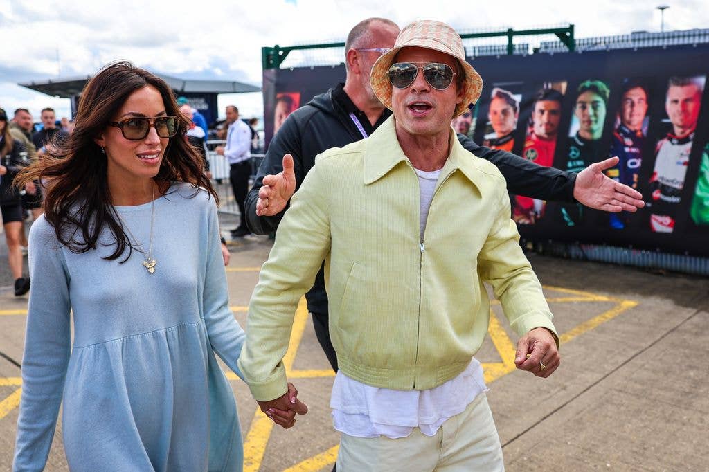 Brad Pitt, star of upcoming 'F1' movie, arrives in the paddock with girlfriend Ines de Ramon during the F1 Grand Prix of Great Britain at Silverstone Circuit on July 7, 2024 in Northampton, United Kingdom. (Photo by Kym Illman/Getty Images)
