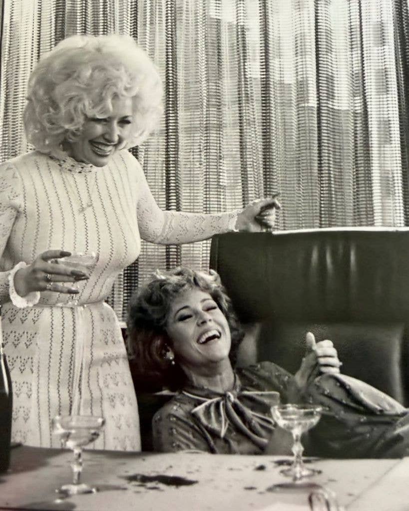 Jane Fonda and Dolly Parton laughing in '9 to 5'
