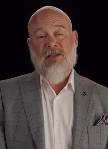 Bryan in gray suit