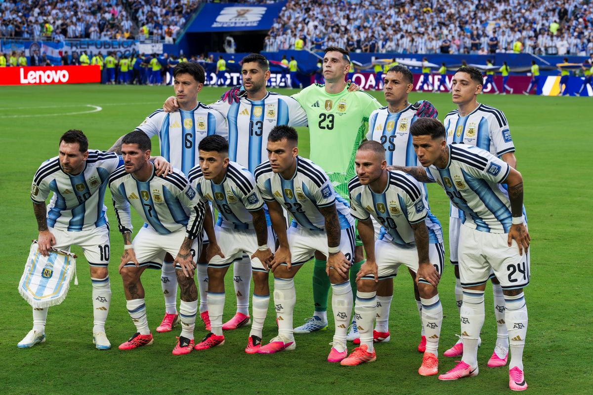 Players of Argentina (Lisandro Martinez, Cristian Romero, Emiliano Martinez, Facundo Medina, Nahuel Molina, Lionel Messi, Rodrigo De Paul, Thiago Almada, Lautaro Martinez, Alexis Mac Allister, Enzo Fernandez) pose for a team photo prior to the FIFA World Cup 2026 round of 32 football match between Argentina and Cabo Verde.