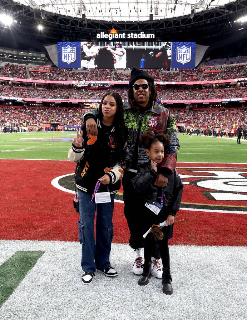 Blue Ivy Carter, Jay Z and Rumi Carter attend the Super Bowl LVIII Pregame at Allegiant Stadium on February 11, 2024 in Las Vegas, Nevada.