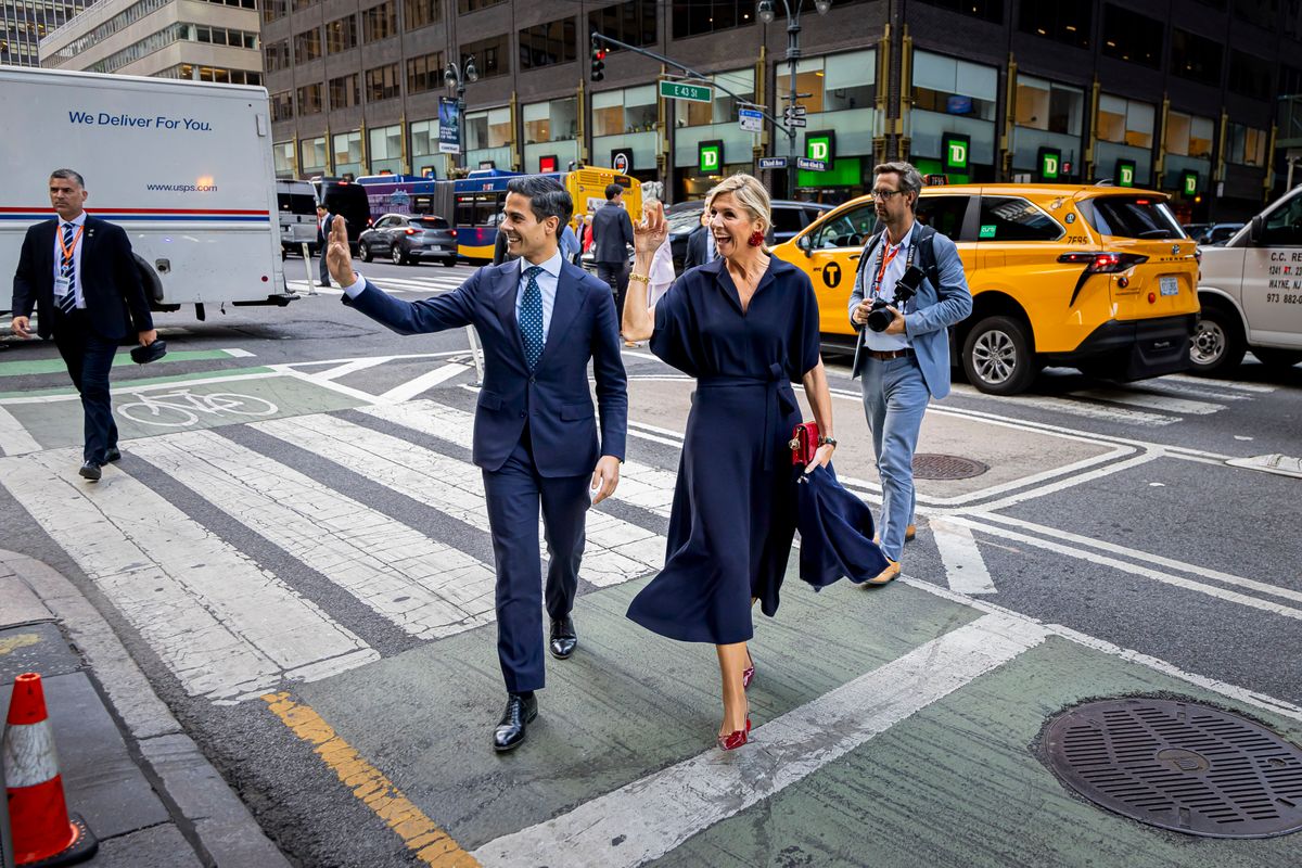 Queen Maxima of the Netherlands walks through the city with Dutch prime minister Rob Jetten