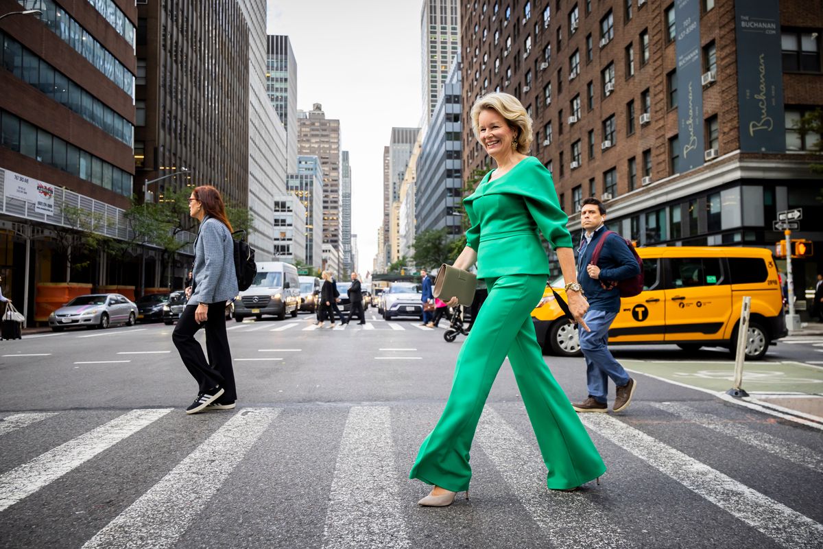 Queen Mathilde brought a modern twist to power dressing with her head-to-toe green look in Manhattan.