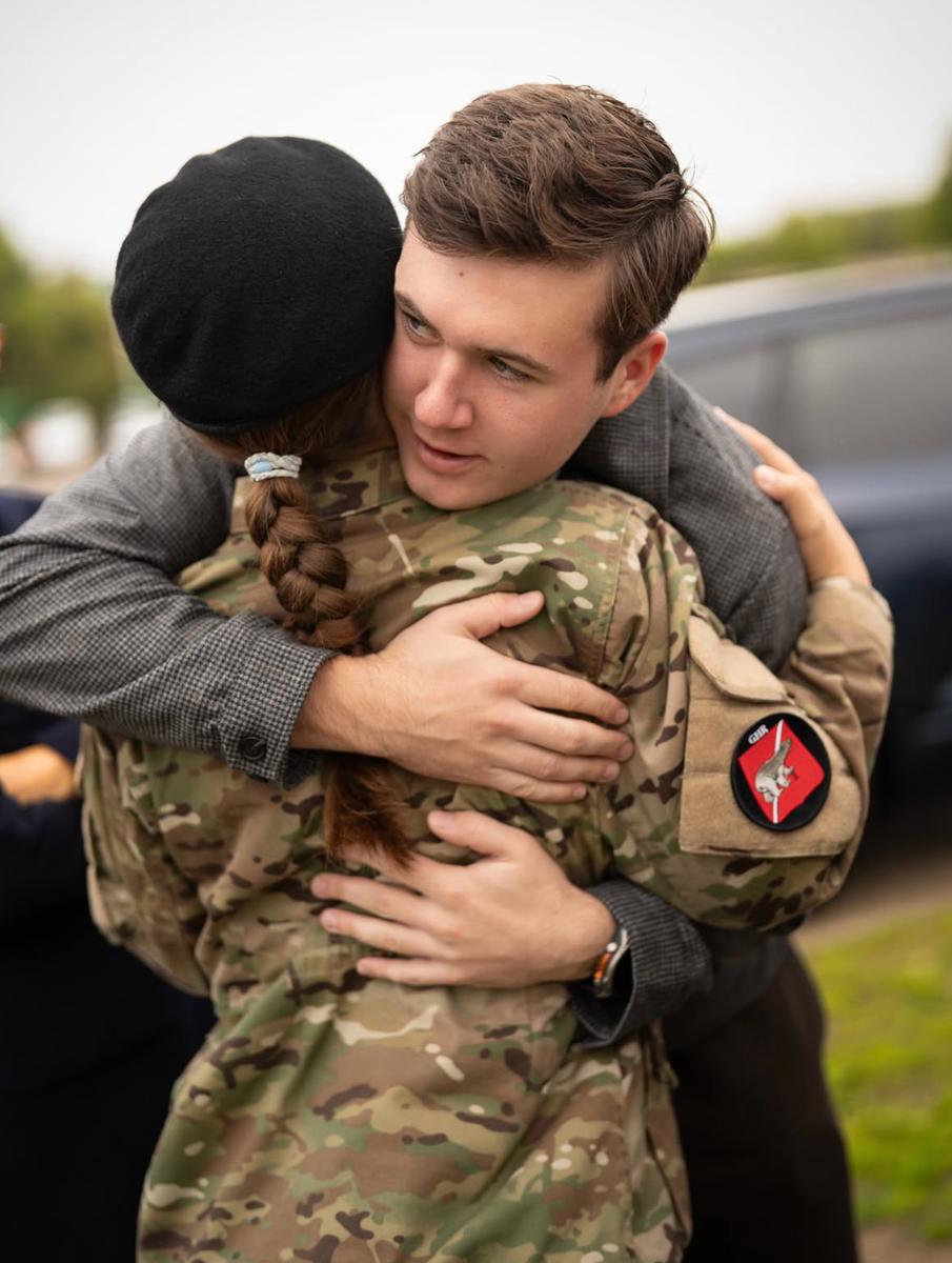 Prince Christian shared a sweet embrace with Princess Isabella during a family visiting day at the military barracks.