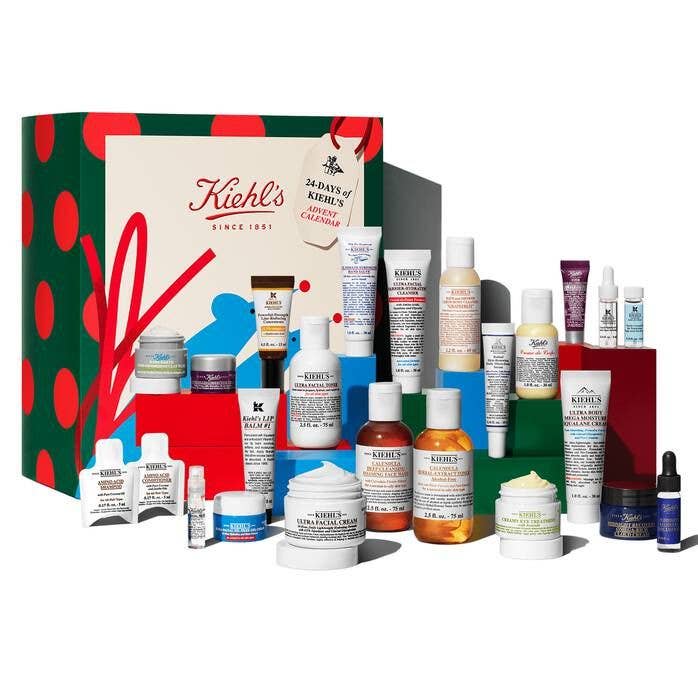 Kiehl's 24-day advent calendar with assorted skincare products displayed.