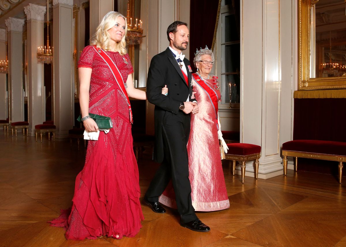 Then-Crown Prince Haakon and Crown Princess Mette-Marit walk alongside Princess Astrid ahead of a dinner at the Royal Palace in Oslo in 2016.