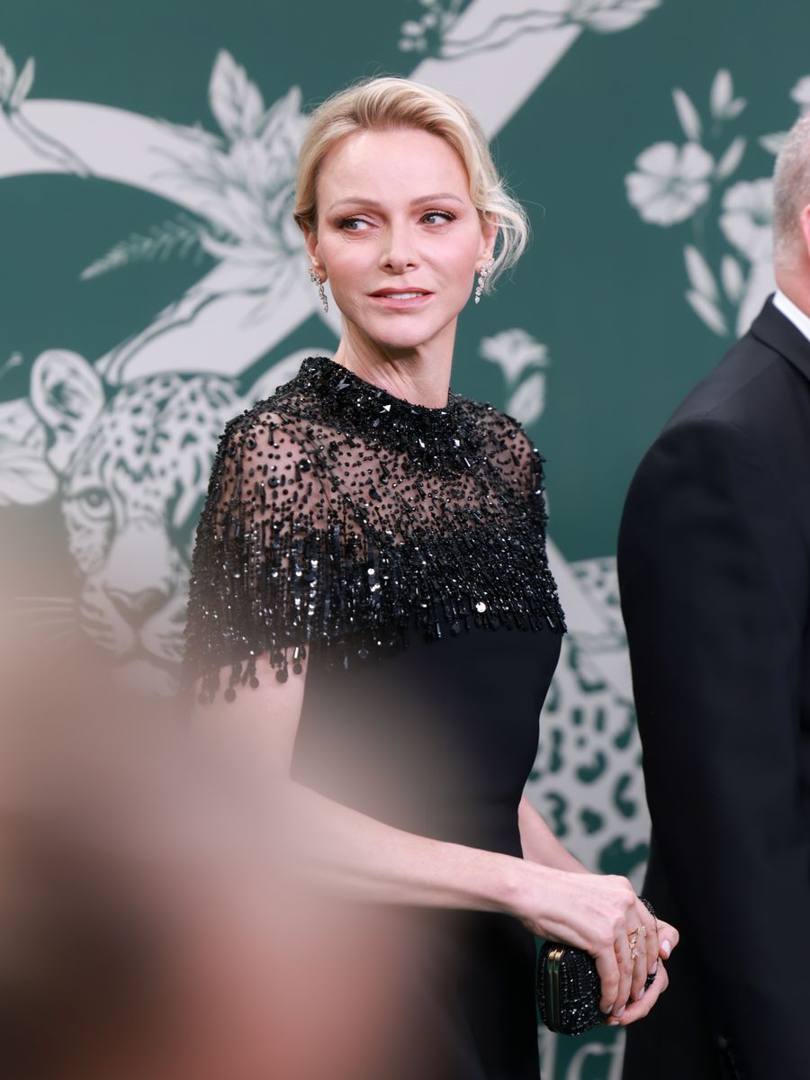 The princess added sparkle to her all-black look with diamond drop earrings and a softly swept updo.
