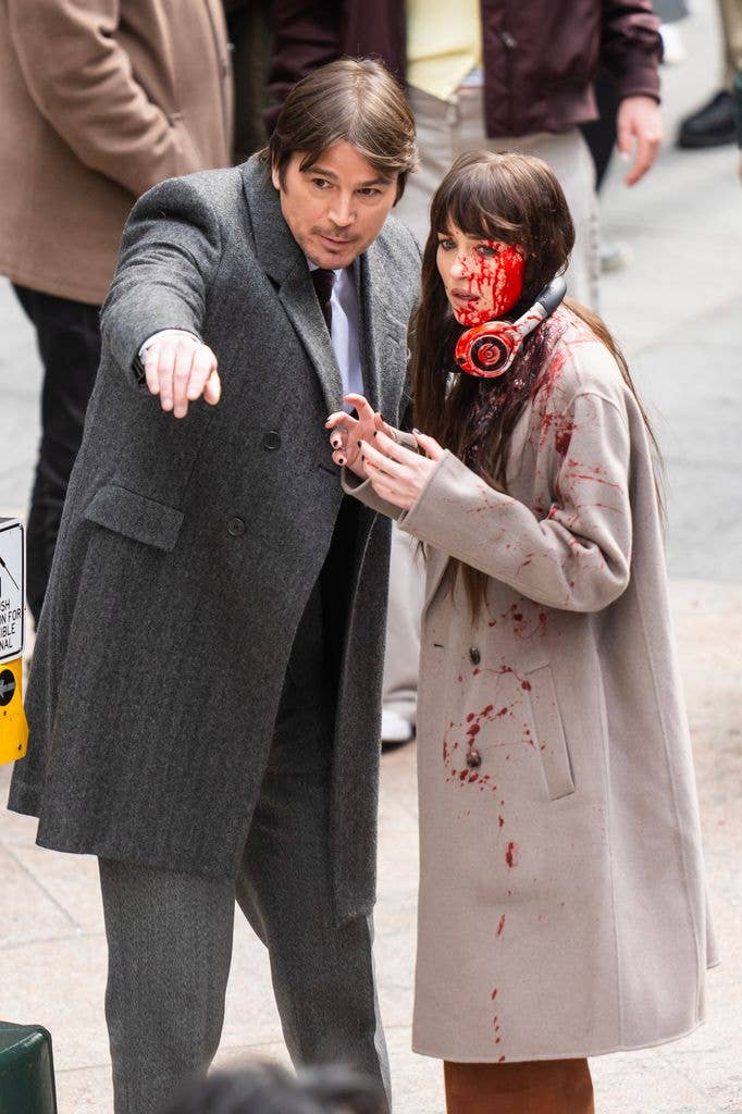 Dakota Johnson and Josh Hartnett are seen on set for 'Verity' in Midtown on March 12, 2025 in New York City