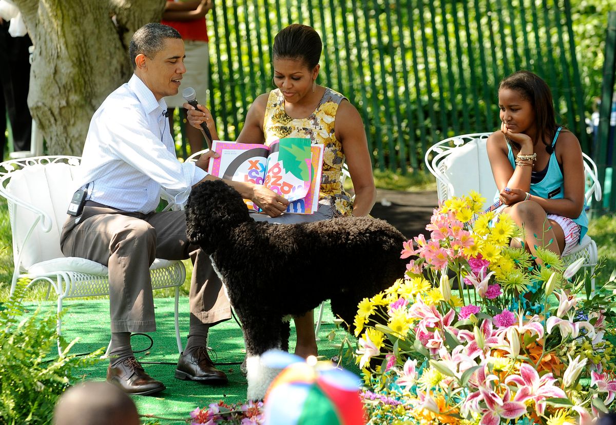 President Barack Obama and first lady Michelle Obama. Sasha Obama and dog Bo