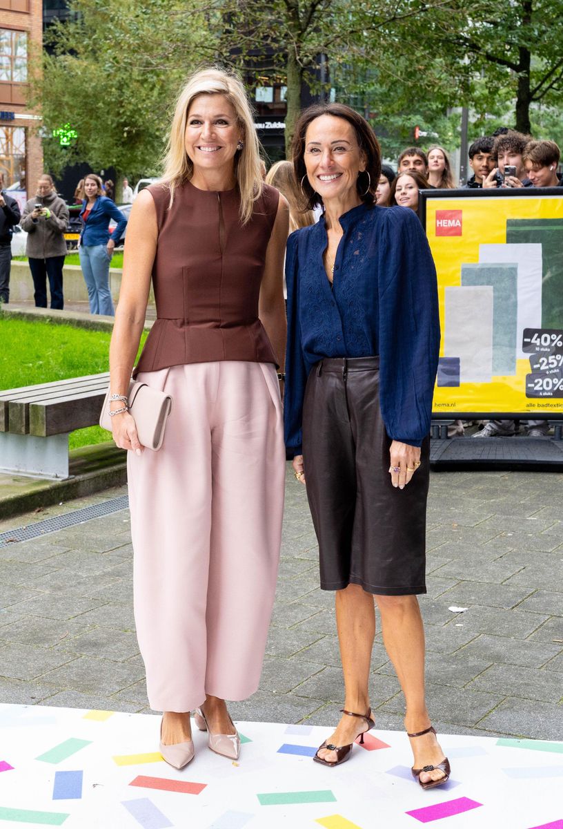 The Dutch Queen teamed a structured sleeveless peplum top with voluminous blush pink trousers for her latest working visit.