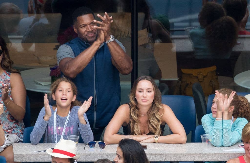 Michael Strahan with 2 daughters and girlfriend Kayla Quick at USTA Billie Jean King National Tennis Center on September 5, 2016 in the Queens borough of New York City. (Photo by BBD/GC Images)