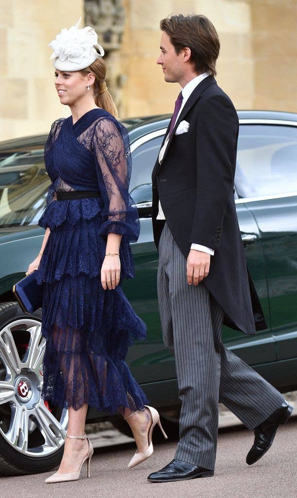Princess Beatrice in a blue lace dress with Edoardo Mapelli Mozzi