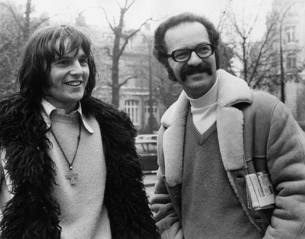 Producer Leo Fuchs talks to actor Murray Head during the filming of 'La Mandarine' at Paris, in 1971. 