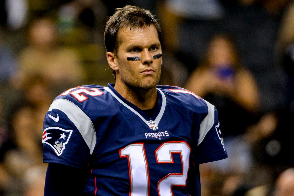 NEW ORLEANS, LOUSIANA - AUGUST 22: New England Patriots quarterback Tom Brady (12) stretches prior to a preseason game against the New Orleans Saints the at the Mercedes-Benz Superdome on August 22, 2015 in New Orleans, Louisiana. (Photo by Derick E. Hingle/Getty Images)