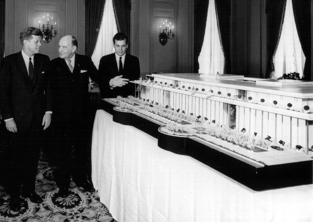 President John F. Kennedy, left, looks at a model of the Kennedy Center October 8, 1963 in Washington, DC.