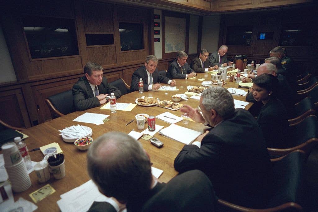 After addressing the nation Tuesday, Sept. 11, 2001, President George W. Bush meets with his National Security Council in the Presidential Emergency Operations Center of the White House