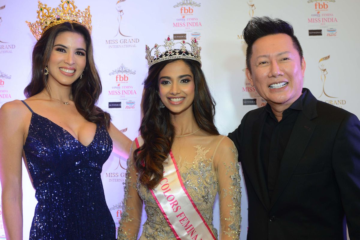 MarÃa Jose Lora (L), winner of Miss Grand International 2017, fbb Colors Femina Miss India 2018 Meenakshi Chaudhary (C) and Miss Grand International (MGI) president Nawat Itsargrisil, pose during a promotional event for the upcoming Miss Grand International Finale 2018 in Amritsar on August 25, 2018. (Photo by NARINDER NANU / AFP) (Photo credit should read NARINDER NANU/AFP via Getty Images)