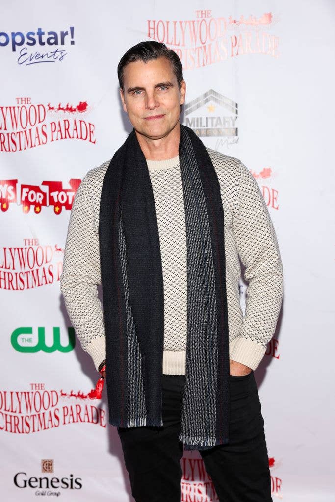 colin egglesfield wearing sweater and scarf