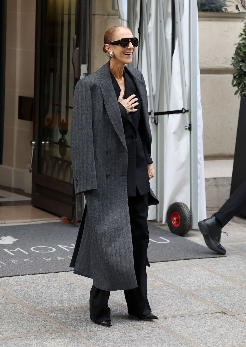 Céline Dion was all smiles as she greeted fans outside the Royal Monceau hotel in Paris on September 16, days after making her long-awaited return to the stage.