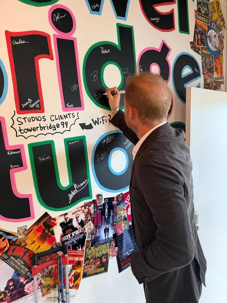 Prince Harry writing on Tower Bridge Studios celebrity wall