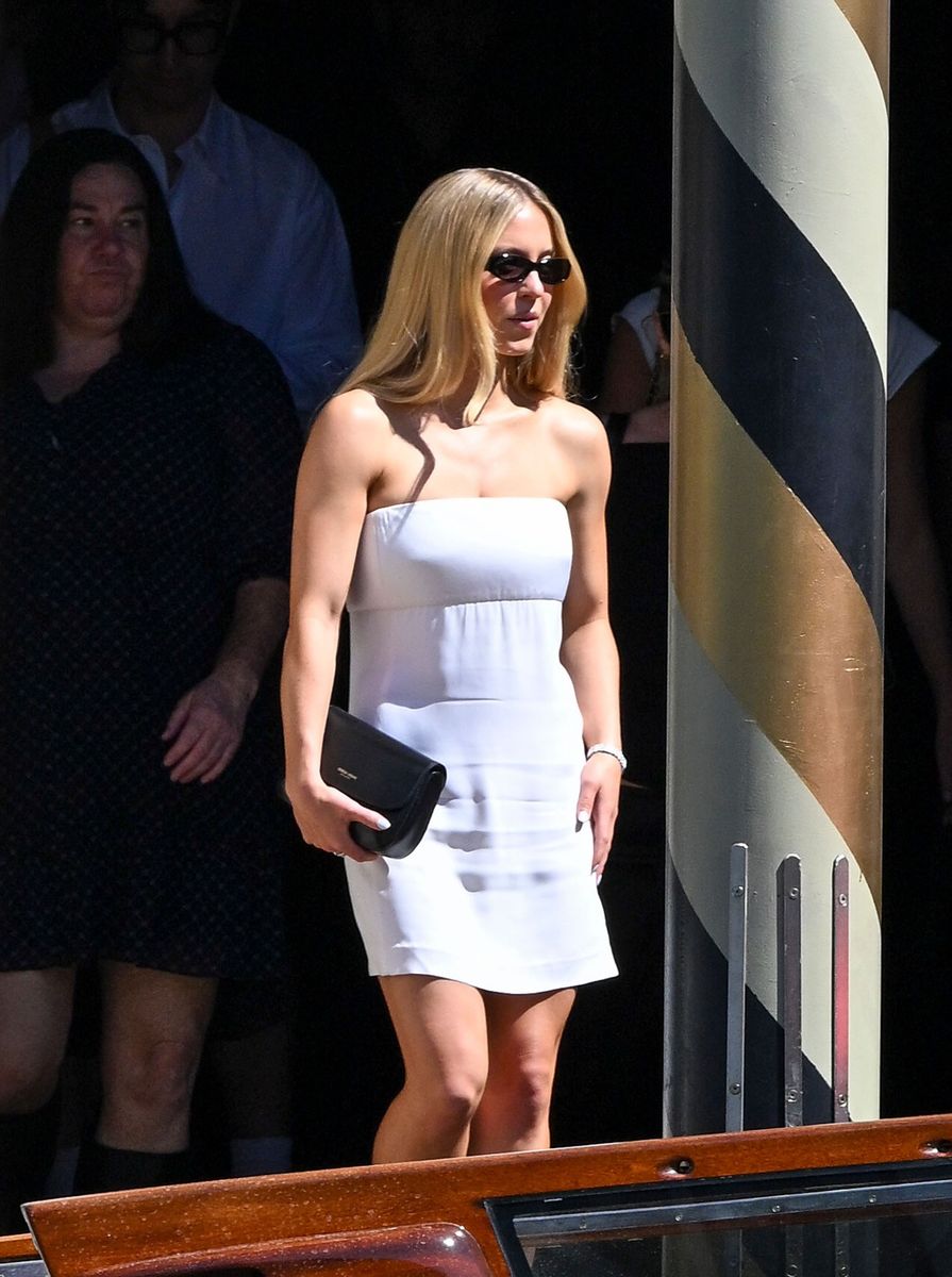 The 28-year-old showed off her long blonde hair, wearing it sleek and straight with a center part for the daytime appearance.