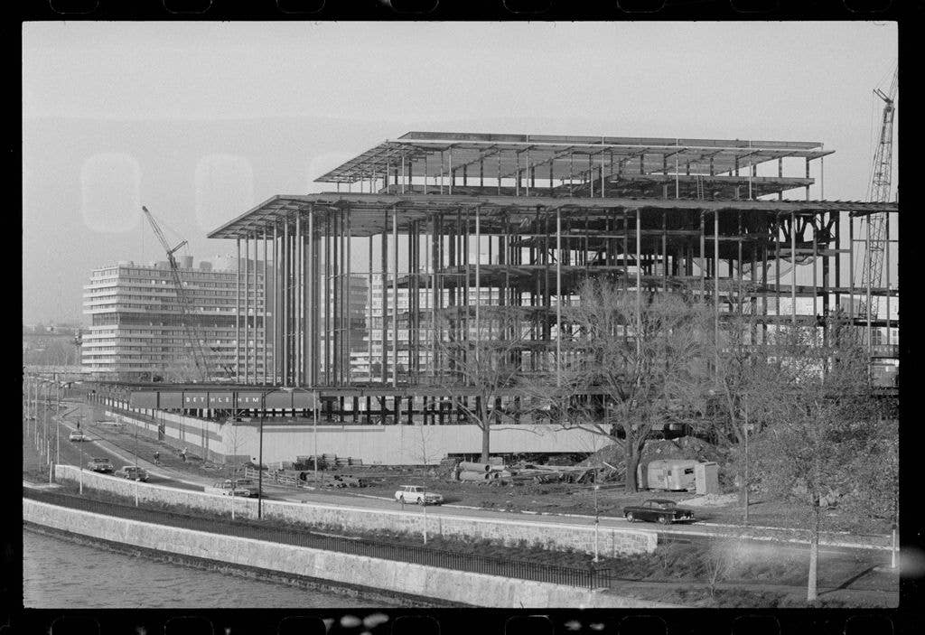 View, from the Potomac River, of the construction of the John F Kennedy Center for the Performing Arts, Washington DC, December 29, 1967