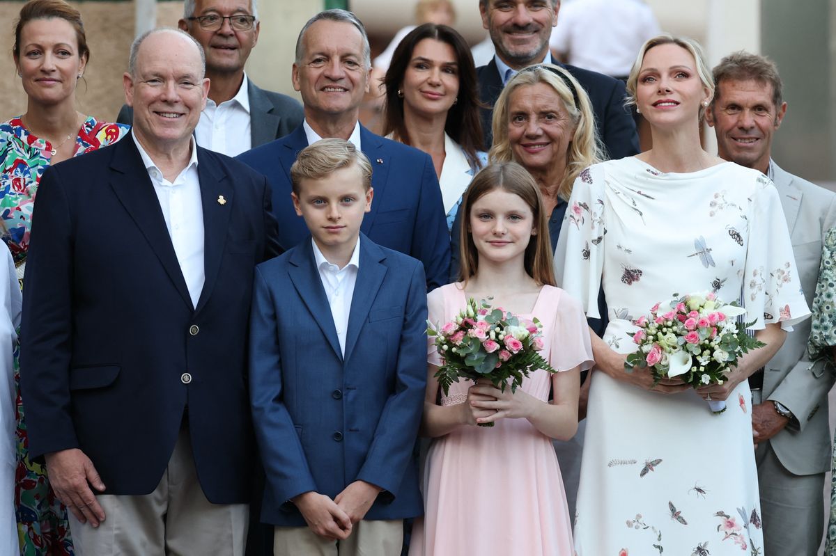 Princess Charlene and Princess Gabriella shared a sweet mother-daughter fashion moment as they arrived carrying coordinating pink and white bouquets.