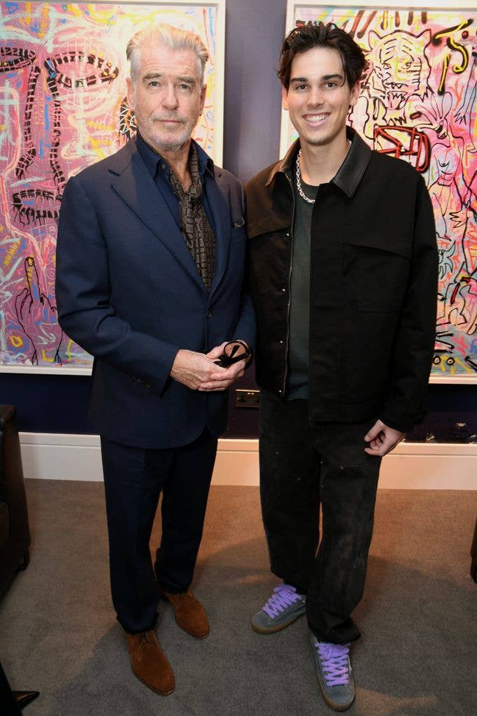 Pierce is a proud supporter of his son, Paris's, art. Both seen here at his debut collection, Collective Energy