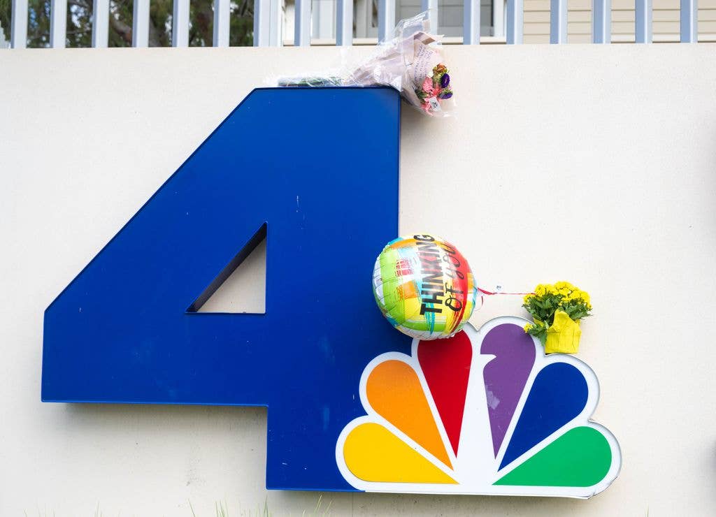 Los Angeles, CA - September 16:Flowers are left at NBC4 and Telemundo in University City on Wednesday, September 16, 2026 for victims of the helicopter crash in Chatsworth.