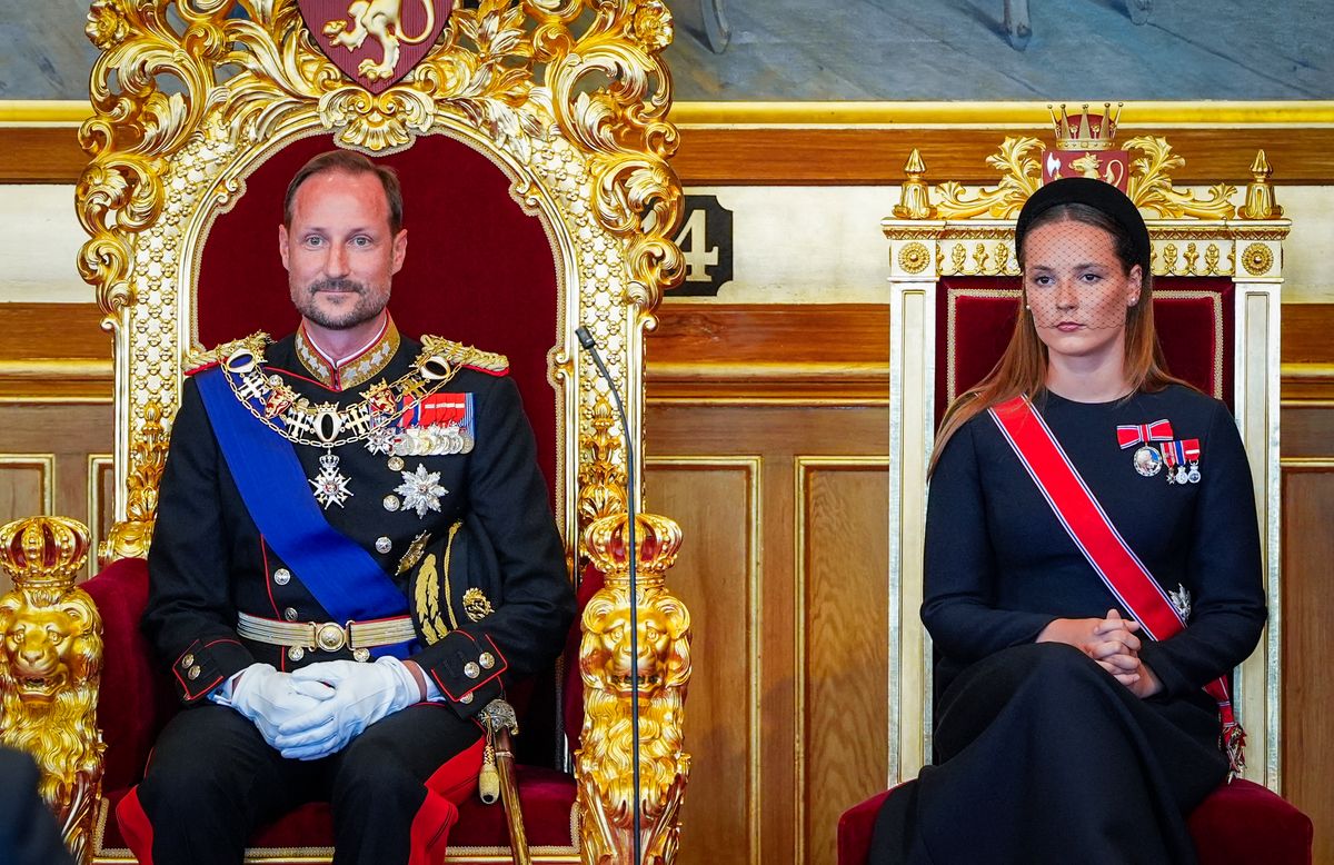Crown Princess Ingrid Alexandra of Norway sits next to her father King Haakon VIII during an oath-taking ceremony for the new king