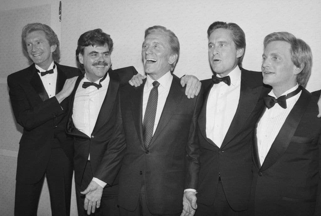 Kirk surrounded by his four sons, Peter, Joel, Michael, and Eric