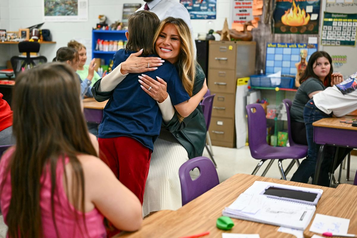 Melania shared a sweet moment with a young student who asked the first lady for a hug during her classroom visit.