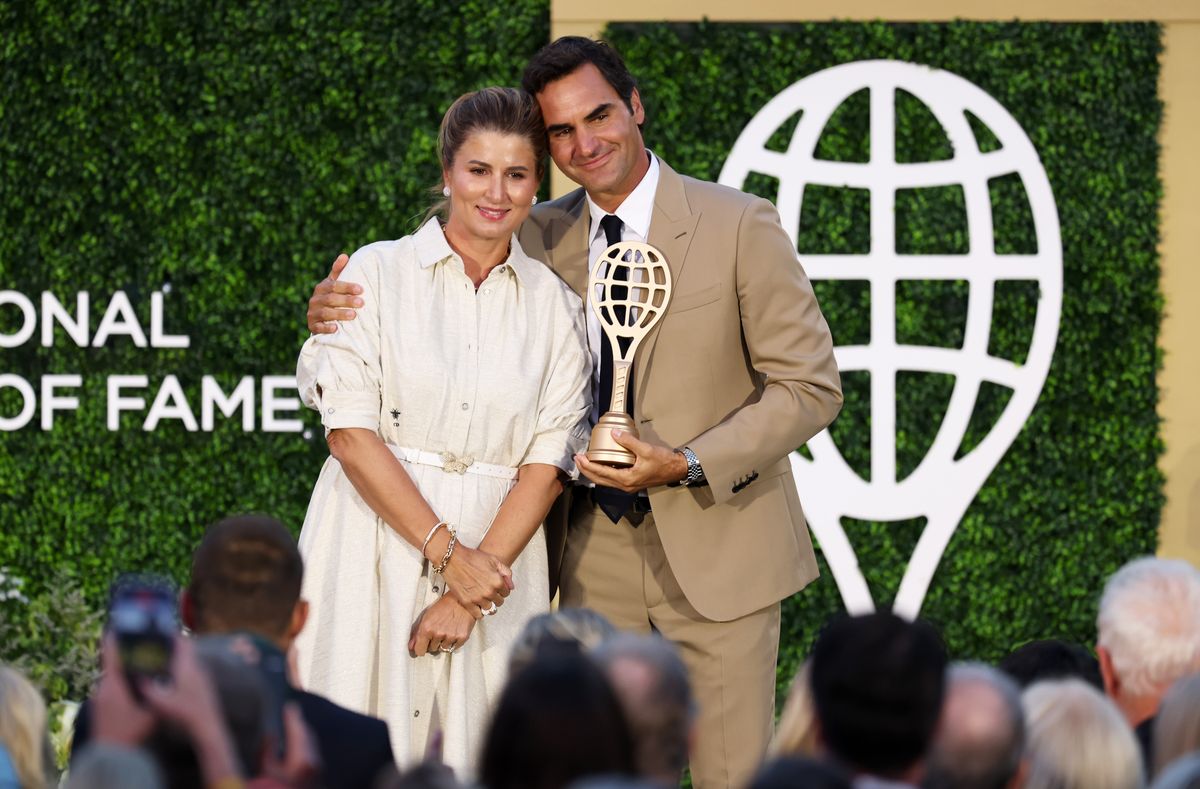 Roger Federer and wife, Mirka Federer, posing for a photo during the International Tennis Hall of Fame 2026 Induction Ceremony
